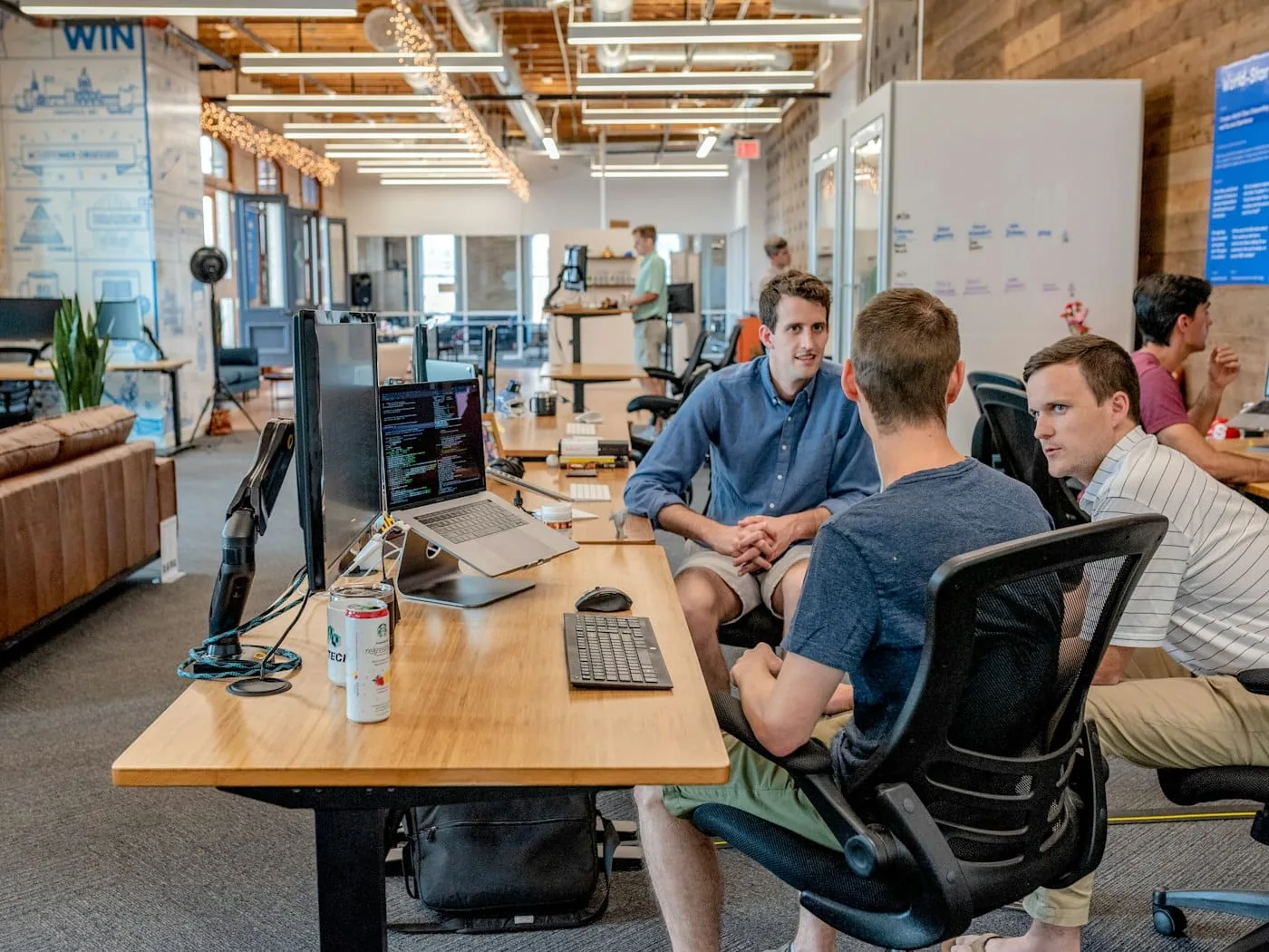 A ZPulse advisor meeting with a business owner at a table